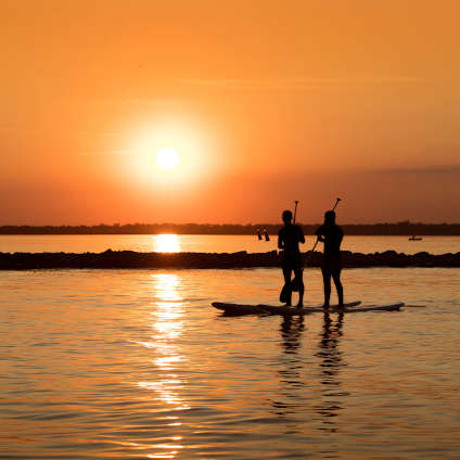 Paseo en SUP en Ibiza a la puesta de sol