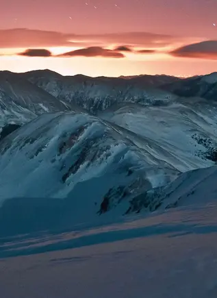 Excursión Nocturna en Raquetas de Nieve por Fuentes de Invierno