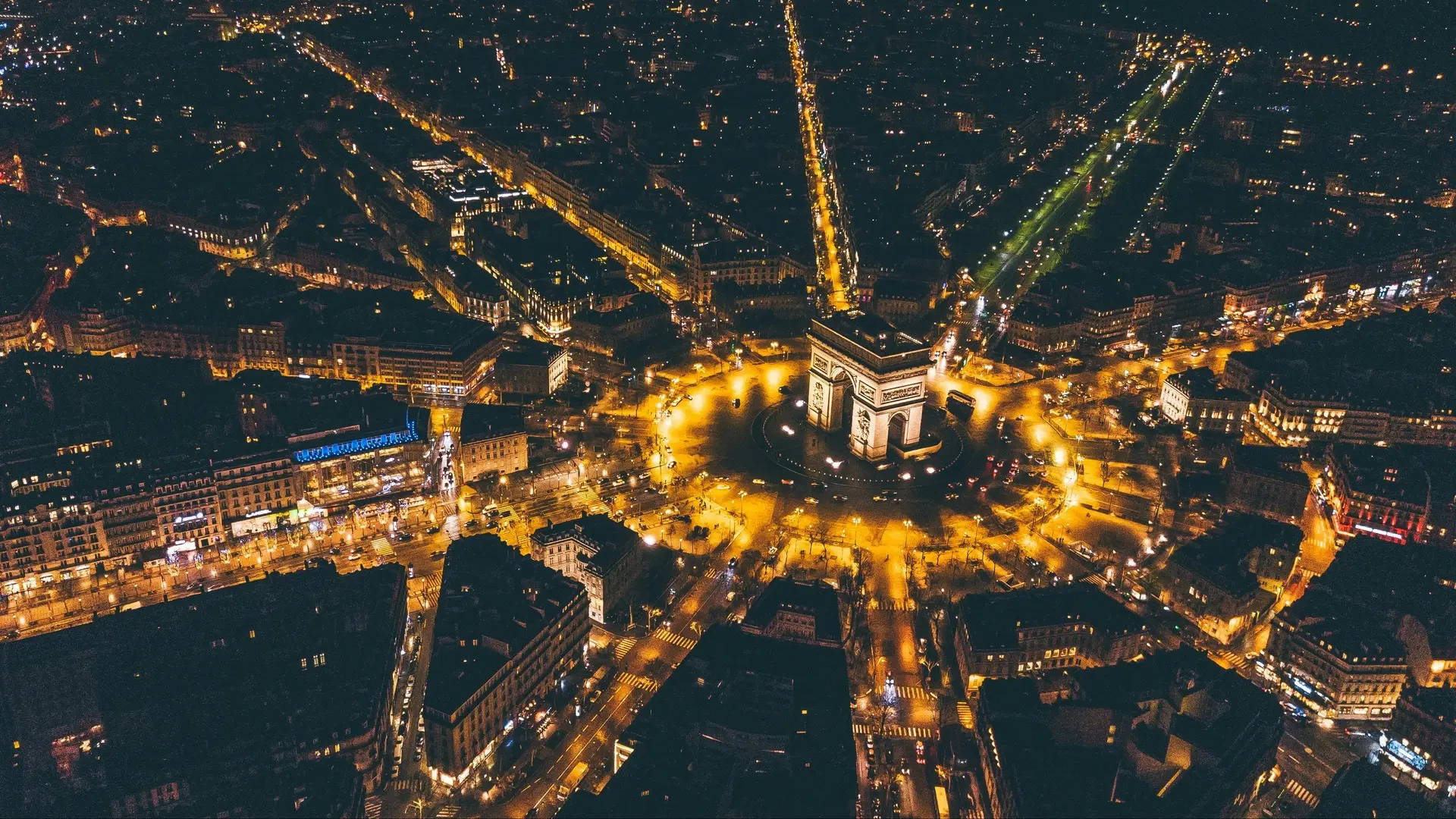 Tour nocturno por París con paseo en barco por el Sena